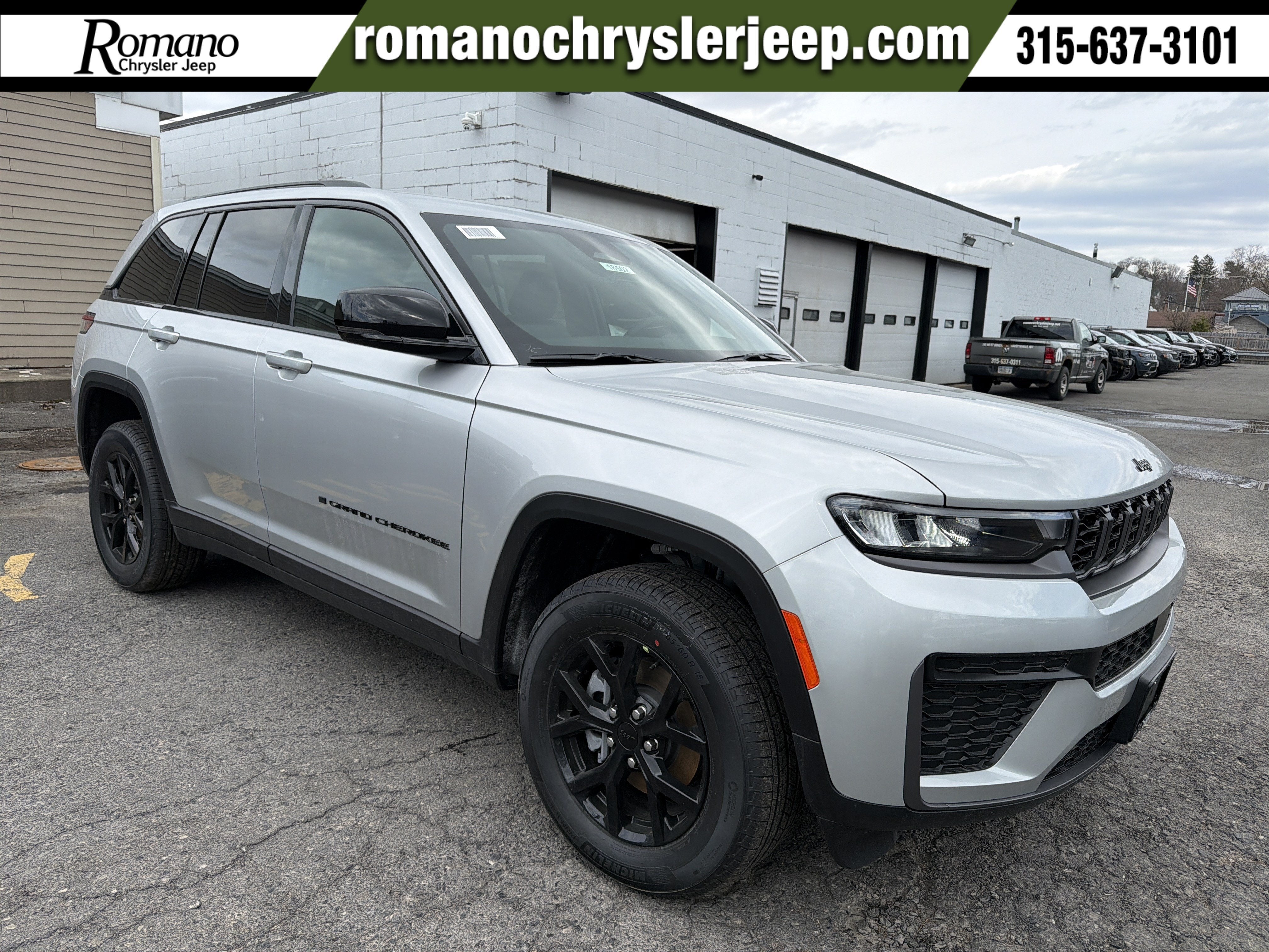 2026 Jeep Grand Cherokee Laredo Altitude in Silver Zynith — front three-quarter view