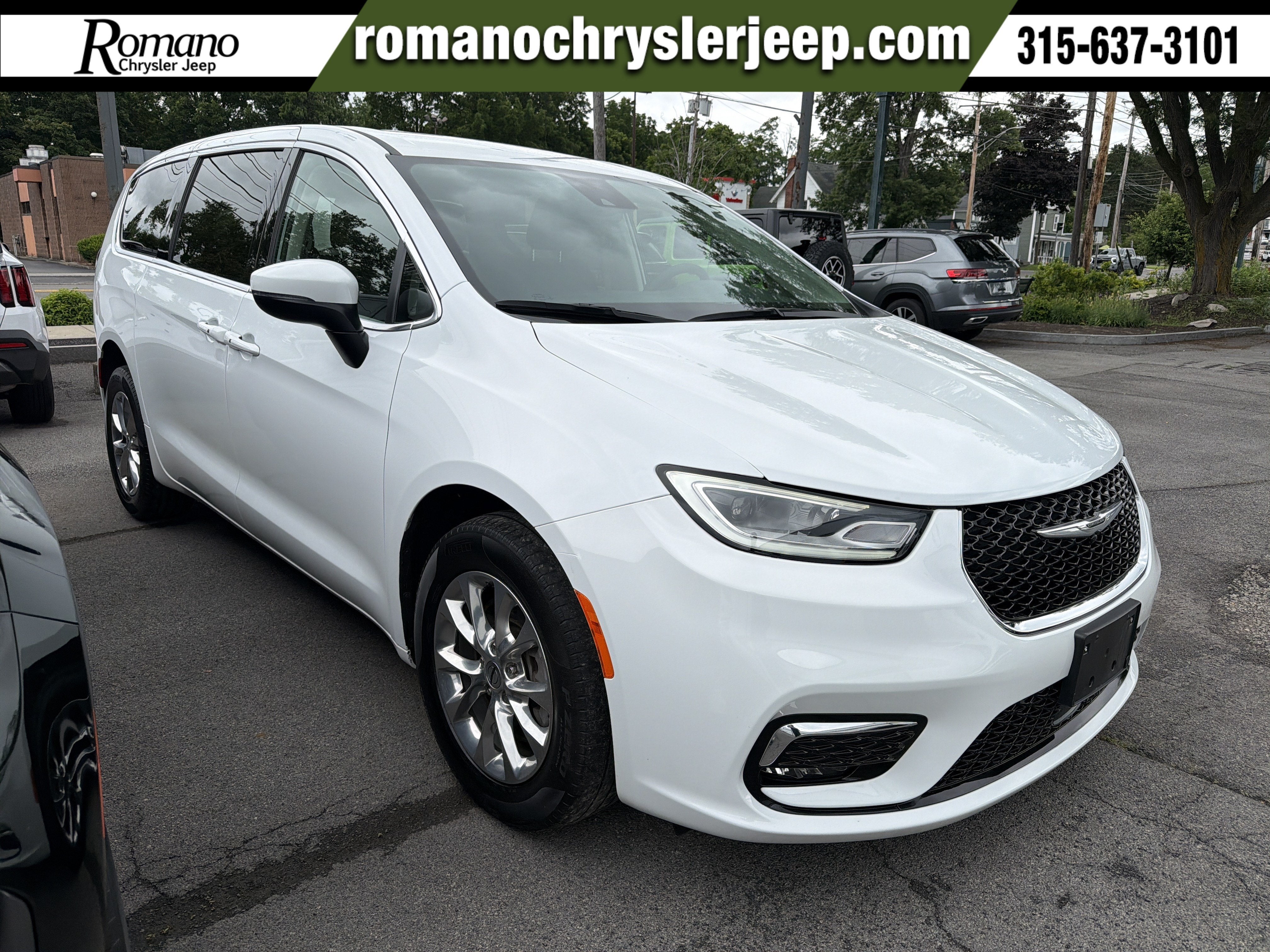 2023 Chrysler Pacifica Touring L in Bright White Clearcoat — front three-quarter view