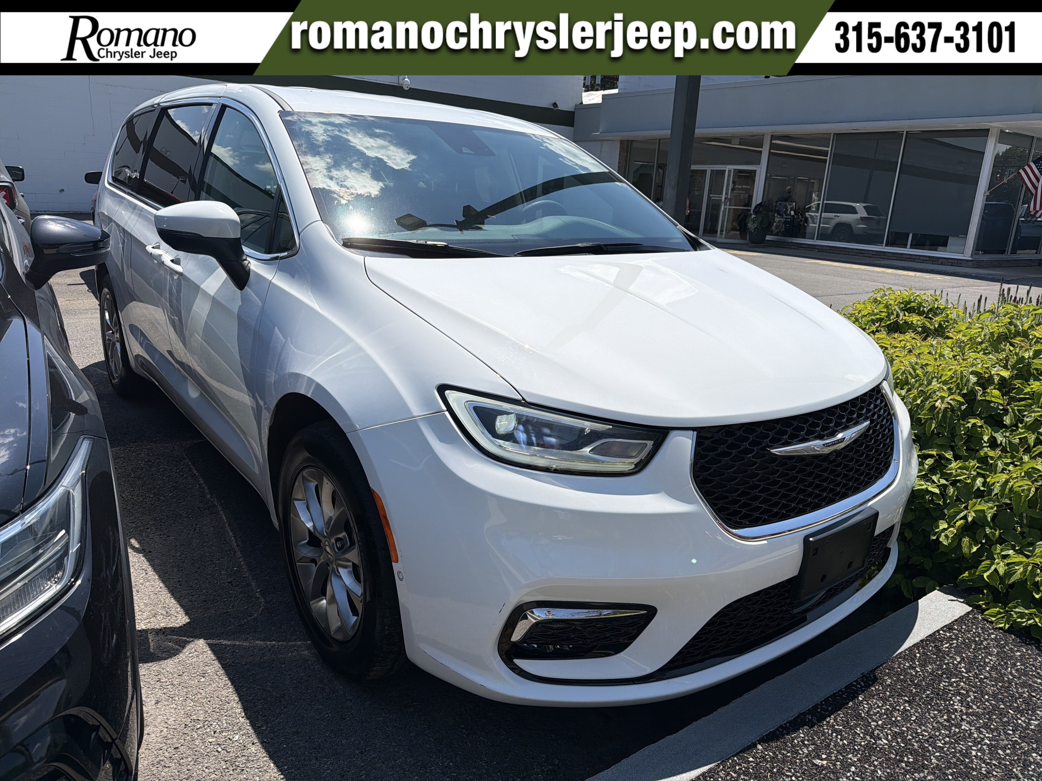 2023 Chrysler Pacifica Touring L in Bright White Clearcoat — front three-quarter view