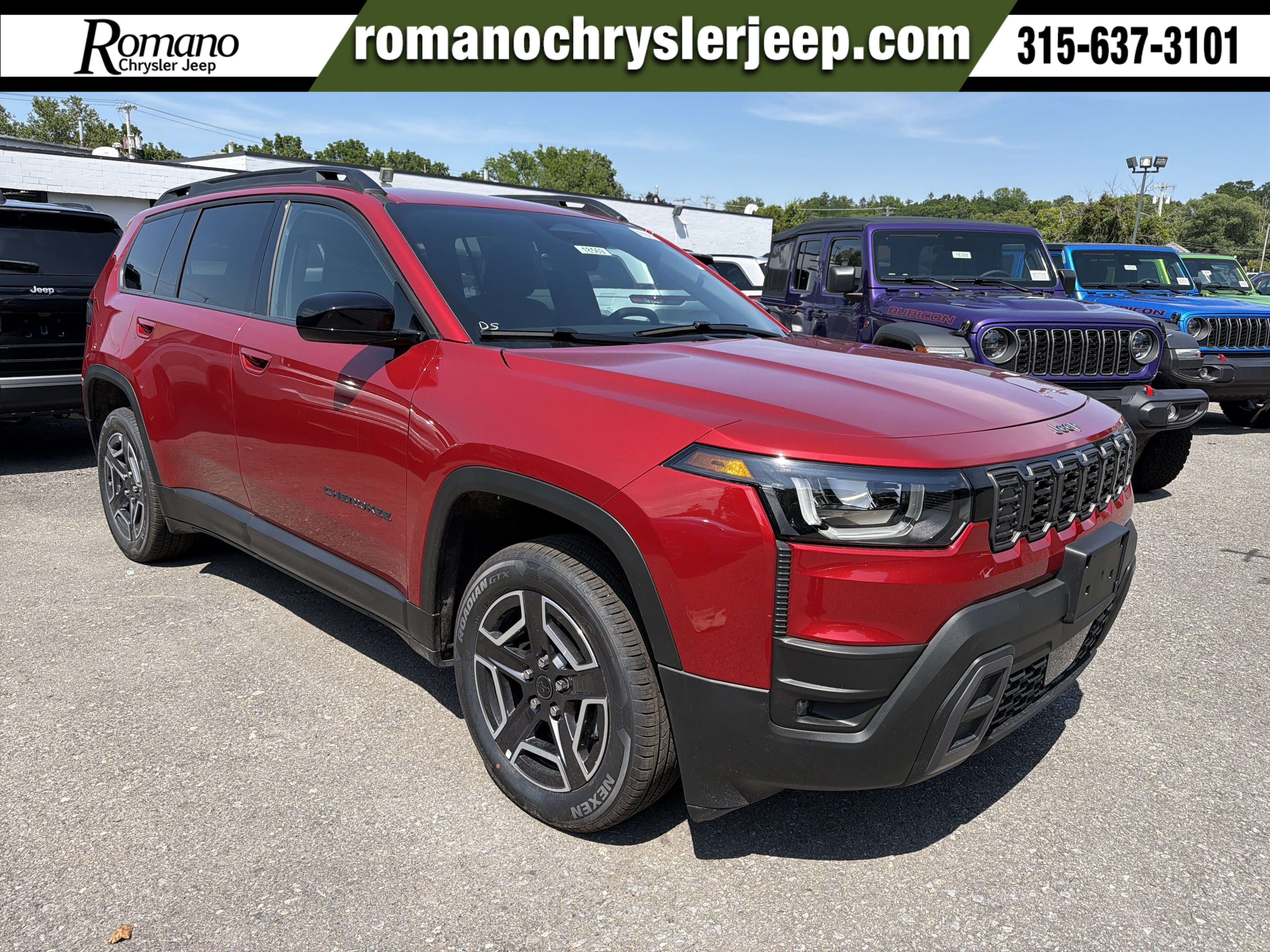 2026 Jeep Cherokee Laredo in Red Hot Pearlcoat — front three-quarter view