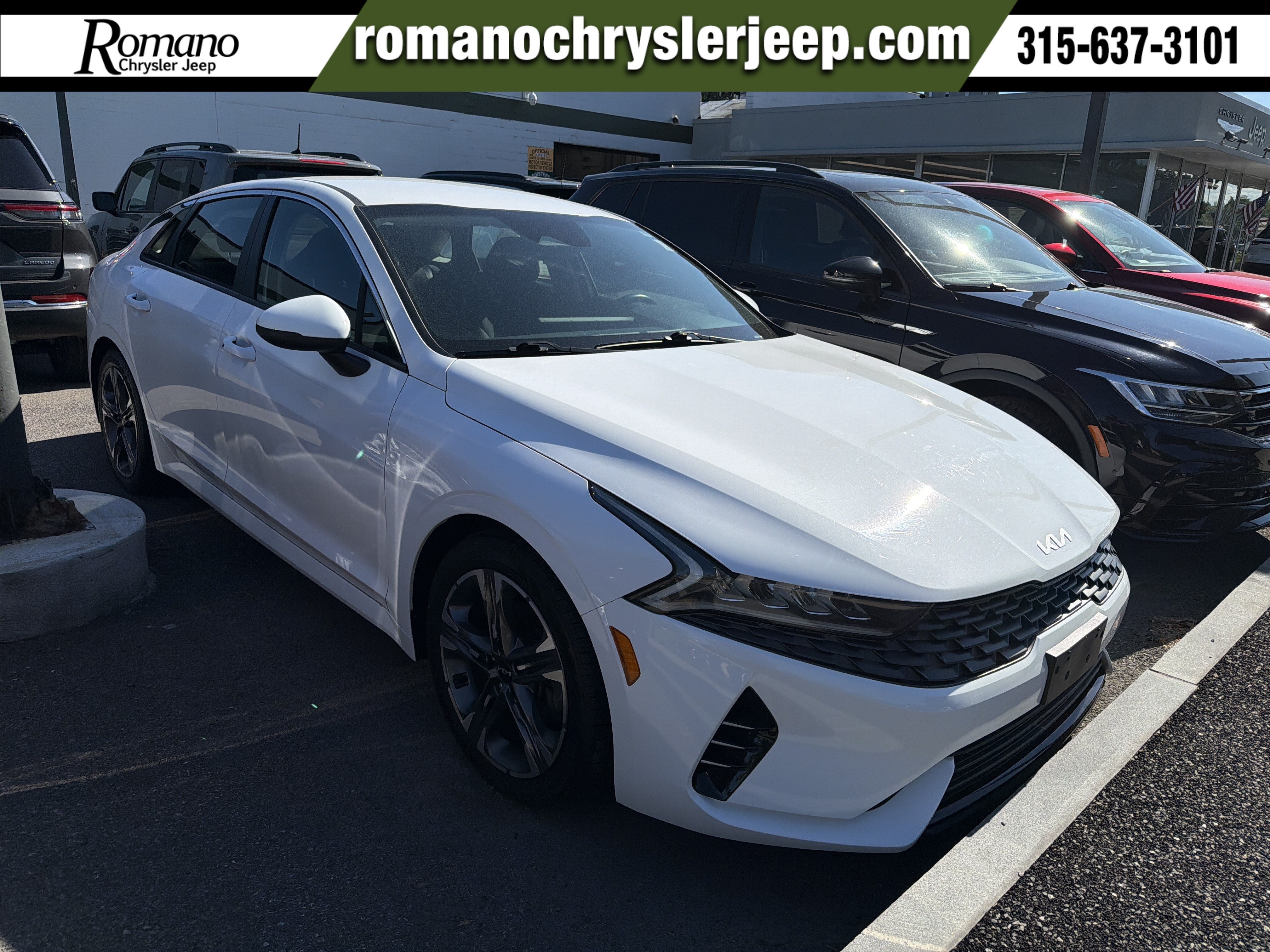 2022 Kia K5 LXS in Glacial White Pearl — front three-quarter view