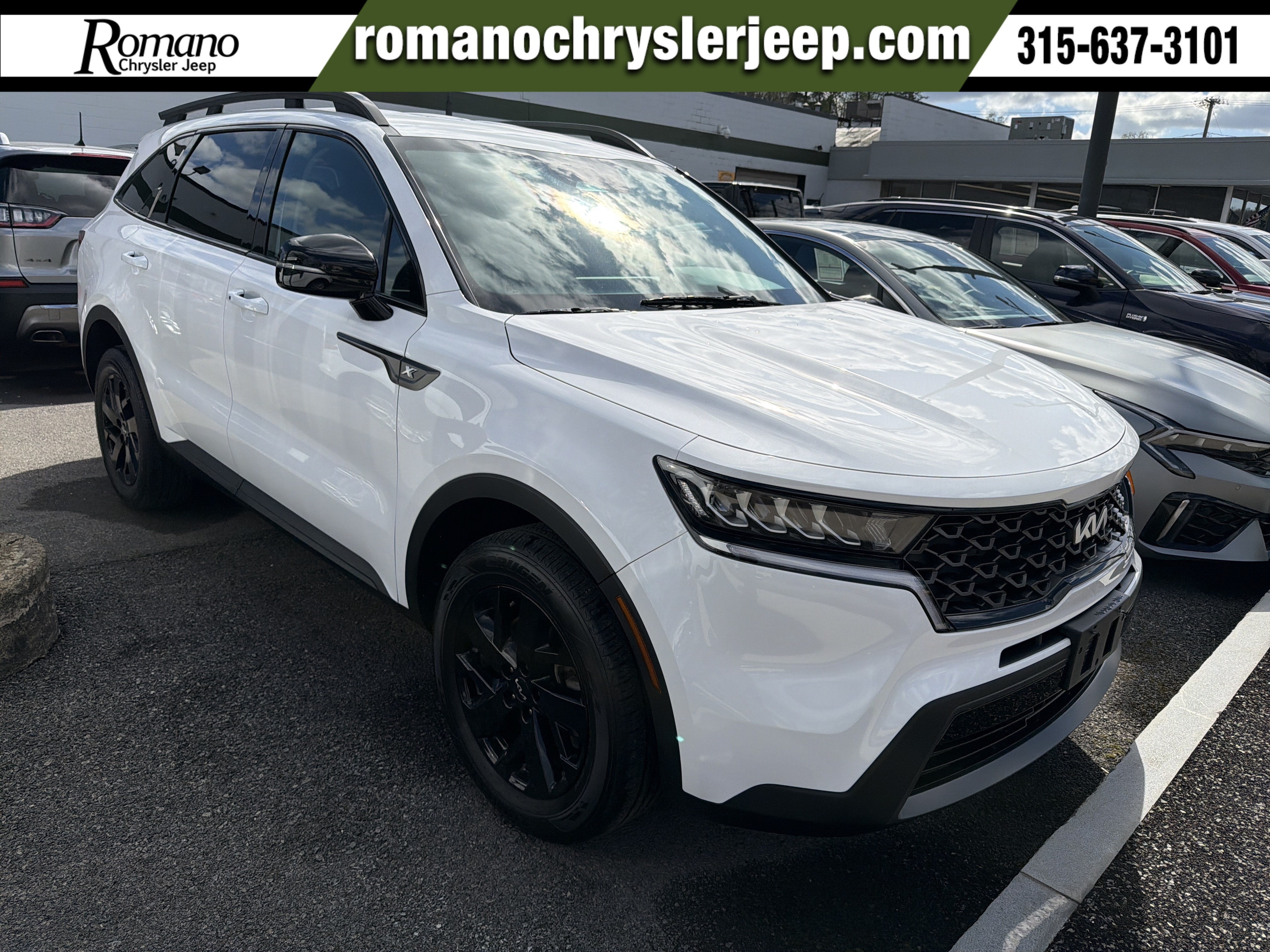 2023 Kia Sorento X-Line S in Glacial White Pearl — front three-quarter view
